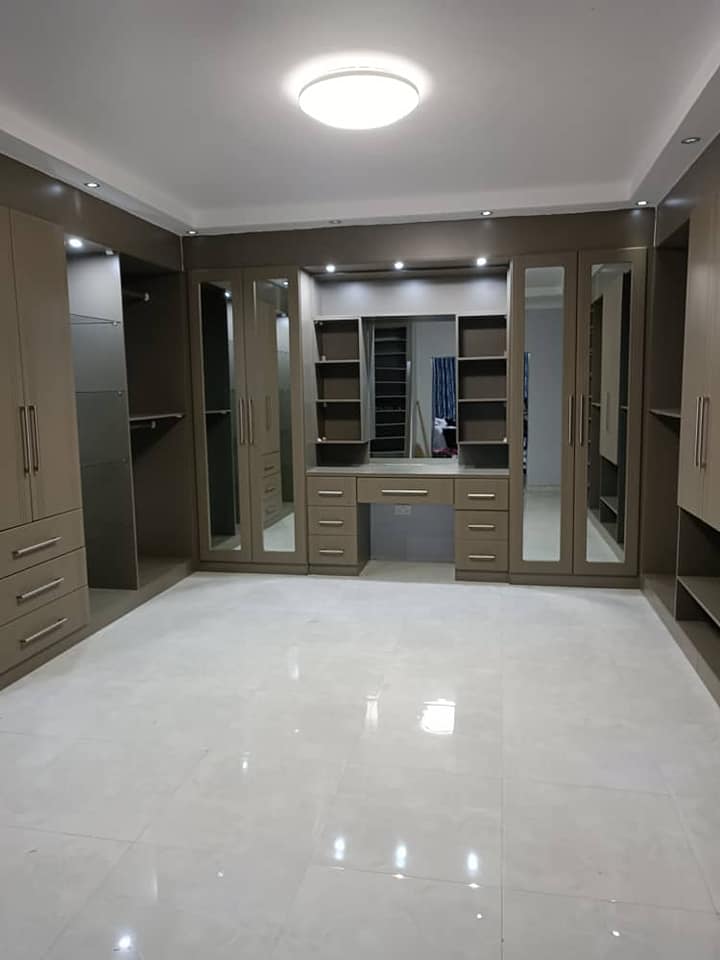 Luxury built-in wardrobe after One Touch installation